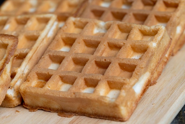 Square sweet soft waffles on the table