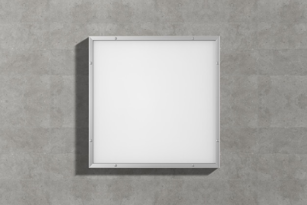 A square white frame on a wall with the word art on it.