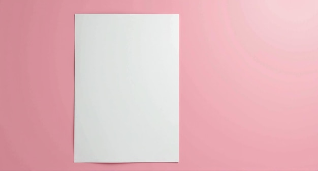 a square of white paper is on a pink background