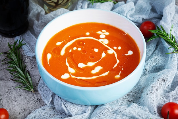 Sream soup of tomatoes and pepper Hot tomato soup in bowl