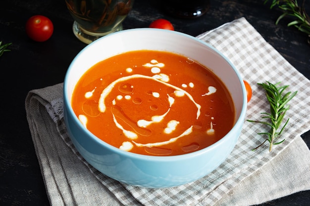 Sream soup of tomatoes and pepper Hot tomato soup in bowl