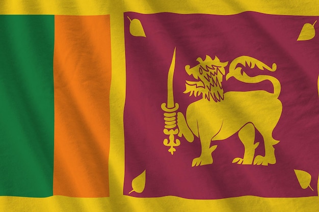 Sri Lanka flag with big folds waving close up under the studio light indoors The official symbols and colors in banner