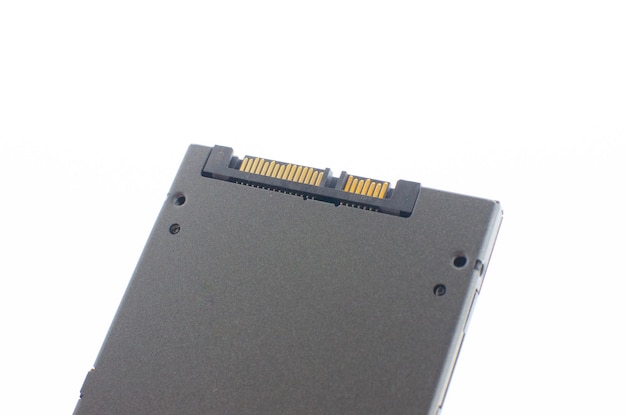 SSD high speed storage on top of gray laptop computer with SSD Concept technology informatics.