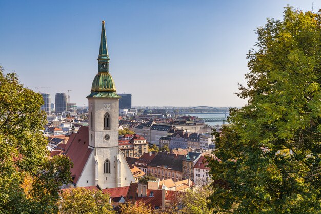 St Martin Cathedral clock tower and Bratislava city and Danube river view