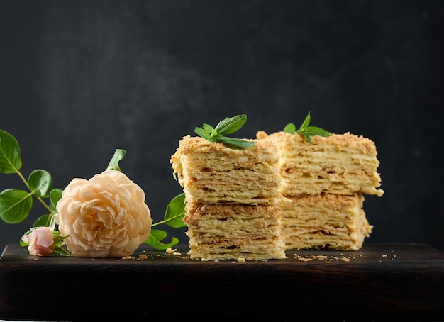 A stack of baked Napoleon pie slices with cream Puff pastry delicious dessert