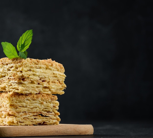 A stack of baked Napoleon pie slices with cream Puff pastry delicious dessert