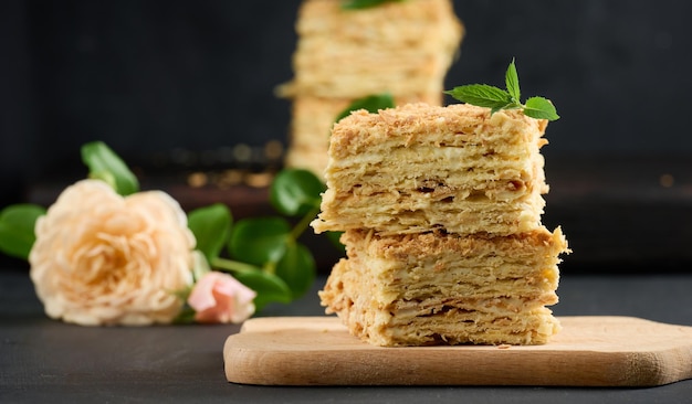 A stack of baked Napoleon pie slices with cream Puff pastry delicious dessert