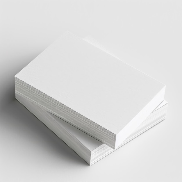 Stack of blank white paper sheets on a neutral background