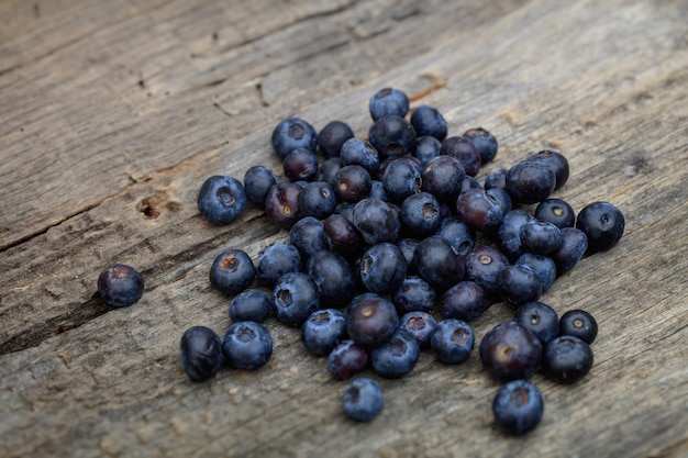 Stack of blueberries on wooden surface