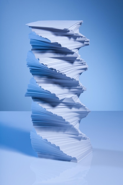 Photo stack of books against blue background