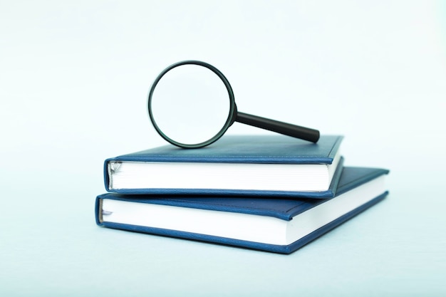 Stack of books with Magnifier