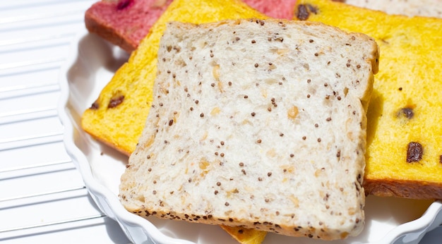 Stack of bread slices with whole grains