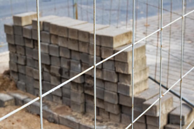 Stack of bricks at a construction site closeup