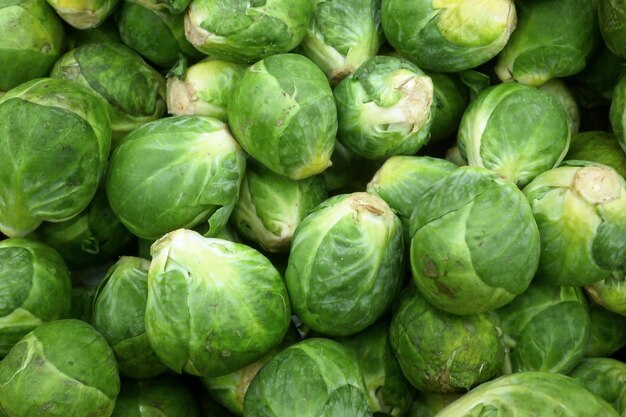 Stack of brussels sprouts on a market stall