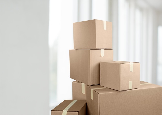 Stack card boxes in a interior empty room