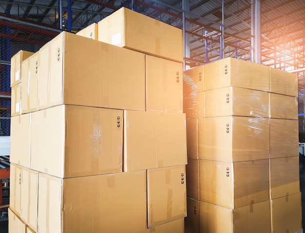 Stack of cardboard boxes in warehouse storage. Warehousing, Shipment, Cargo export.