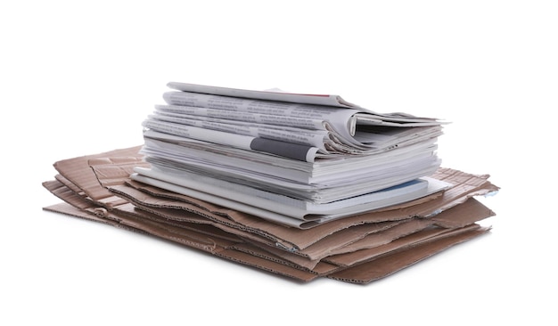 Stack of cardboard and newspapers on white background Recycling rubbish