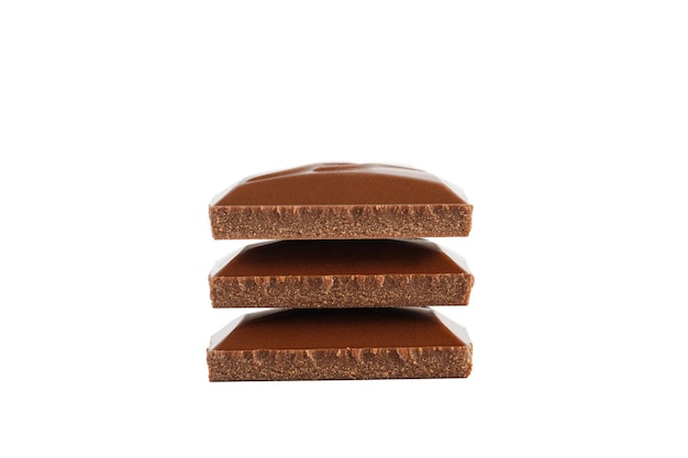 Stack of chocolate bars isolated on a white background Pieces of chocolate