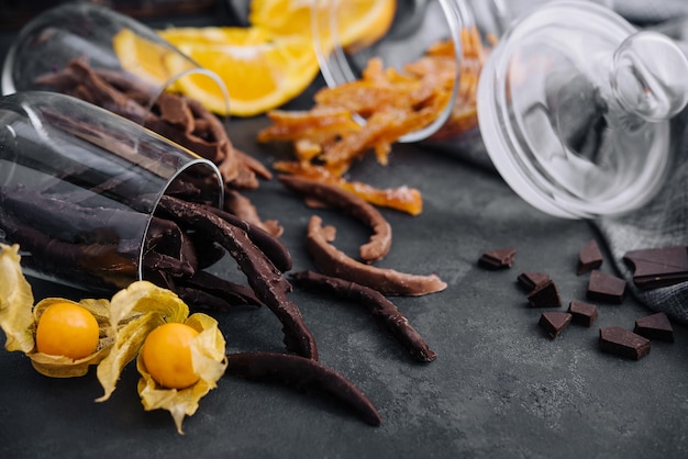 Stack of chocolate sticks on black stone