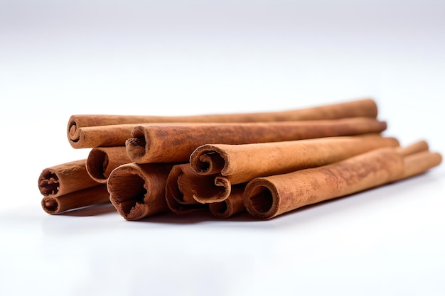 A stack of cinnamon sticks on a white background