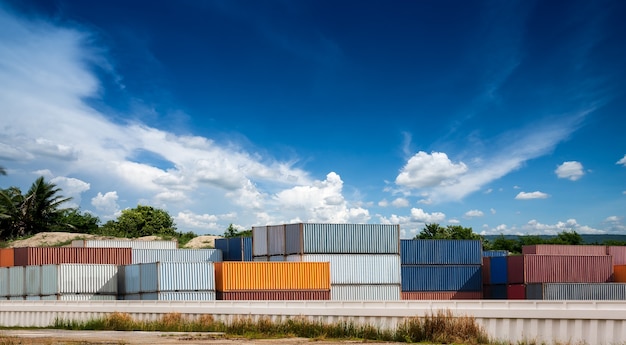 Stack of container at the industrial estate on sunset background