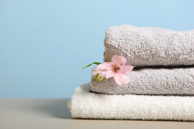 A stack of fresh towels on the table