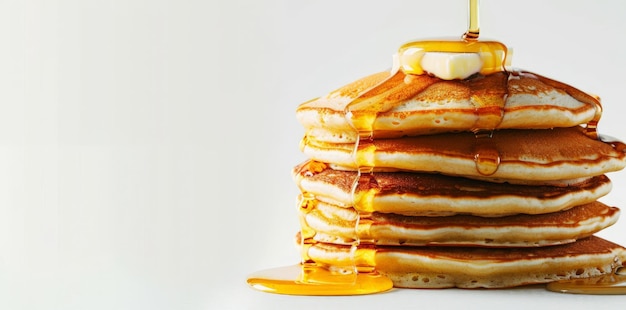 Photo a stack of golden pancakes drizzled with syrup