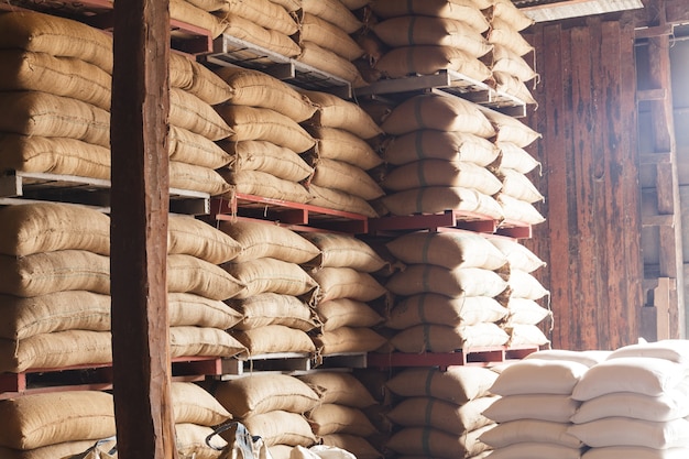 Stack hemp sacks of rice