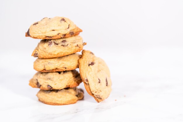 Stack of homemade soft chocolate chip cookies.