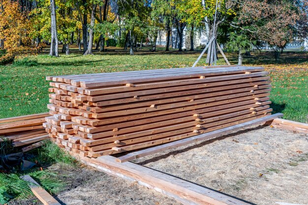 A stack of lumber is stacked on top of each other.