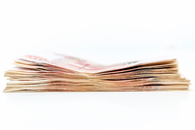 Stack of money side view Russian rubles in denominations of 5000 Selective focus White background