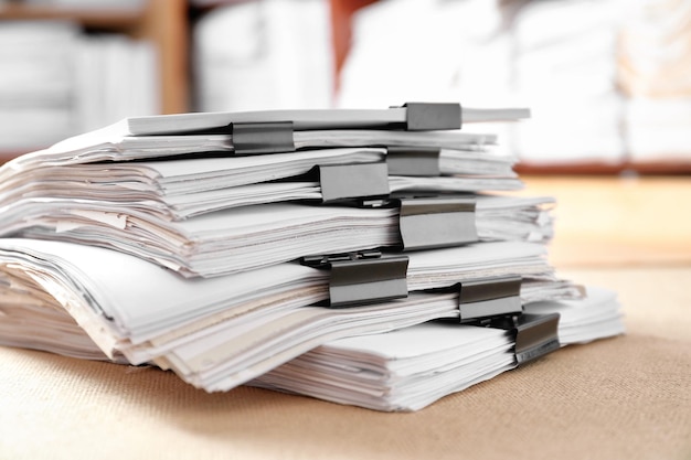 Stack of old paper documents in archive closeup