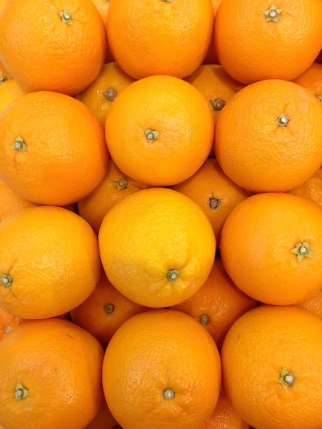 Stack of orange in the box ready for sale in the market.