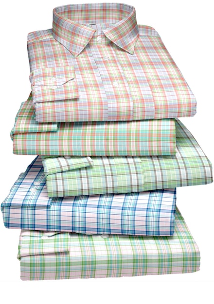 A stack of plaid shirts are stacked on top of each other.