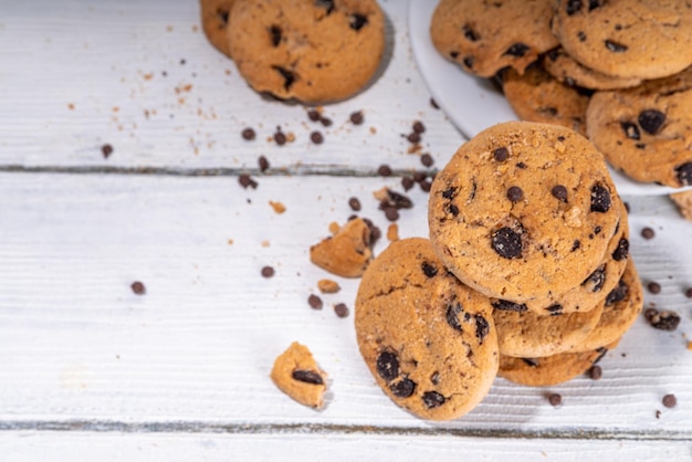 Stack and plate of chocolate chips cookies