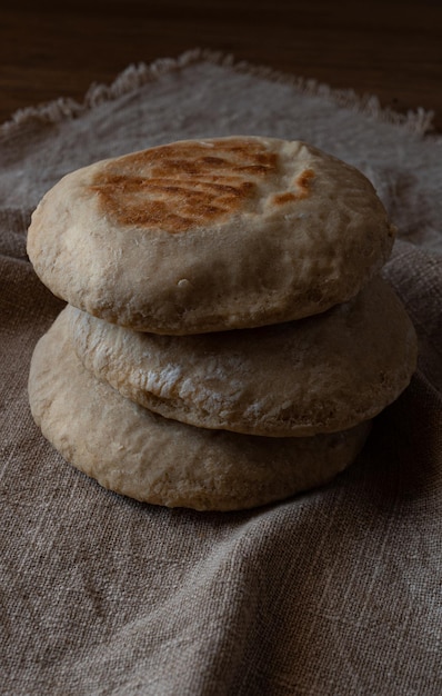 Stack of Portuguese breads Bolo Do Caco