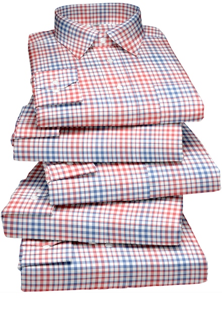 A stack of red, white and blue plaid shirts with a collar on the bottom.