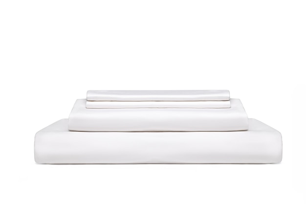 Stack of white folded bedding sheets isolated on white background