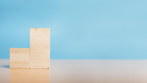 Stack wooden blocks. Blank wood block for insert some sentence, icon, symbol. Business development concept.