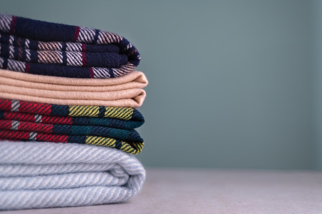 Stack of woolen checked blankets