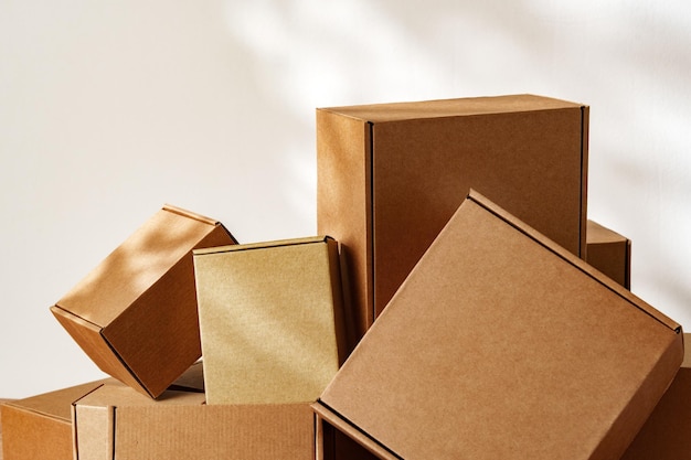 Photo stacked cardboard boxes on wooden surface in sunlight