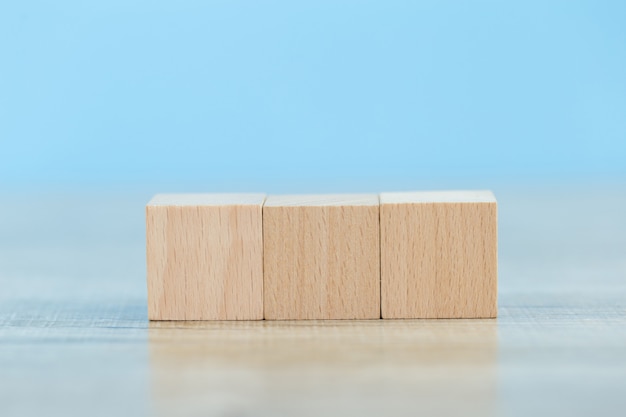 Stacking wooden blocks into steps,Concept of business growth success