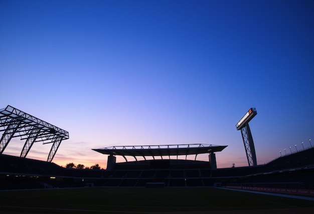 Photo a stadium with a blue sky and a stadium with a blue sky in the background