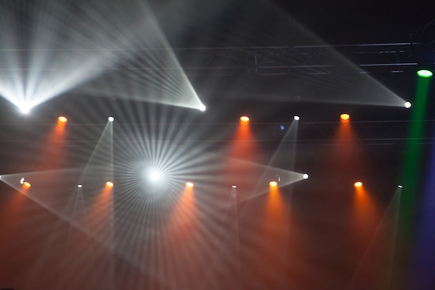 Stage lights on concert Lighting equipment with multicolored beams