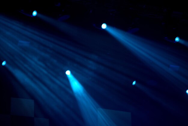 Photo stage lights glowing in the dark live music festival concept background