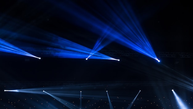 Stage Spotlight with Laser rays. concert lighting background