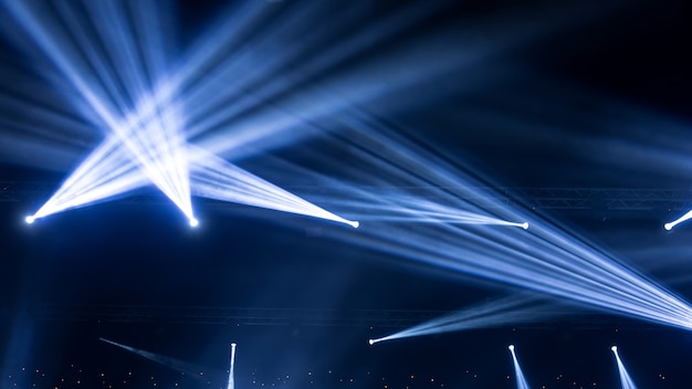 Stage Spotlight with Laser rays. concert lighting background