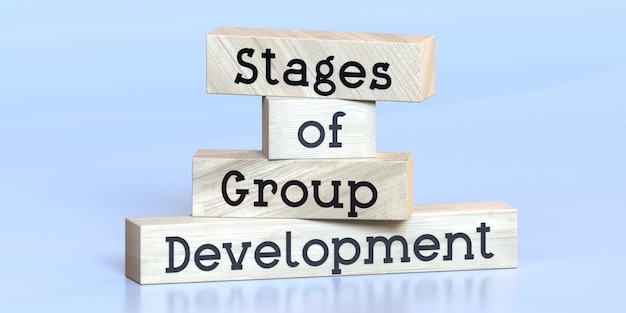 Photo stages of group development words on wooden blocks 3d illustration