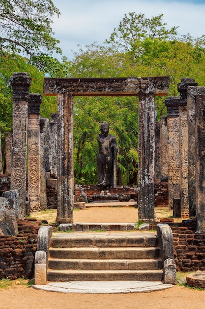 Stainding buddha statue in ancient ruins polonnaruwa sri lanka