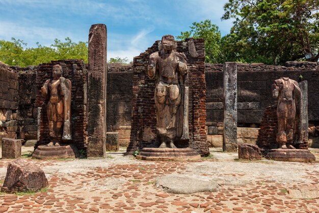 Stainding buddha statue in ancient ruins polonnaruwa sri lanka